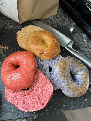 Strawberry bagel (left), cranberry orange bagel (top), blueberry bagel (right)