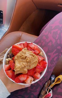 Peanut butter acai bowl with extra pb on top and no banana