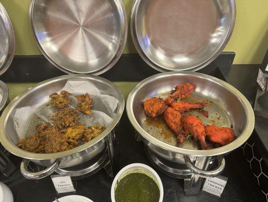 Veggie pakora and tandoori chicken - two of our favorite