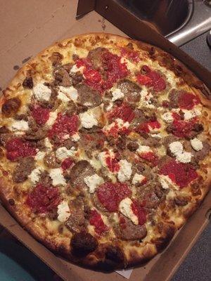 Lasagna Pizza-meatball, sausage, ricotta, mozzarella and their fresh red sauce!