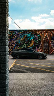 Matte Black Tesla vehicle wrap.