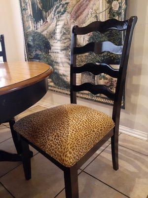 Cheetah Kaufmann upholstry fabric on our repainted high gloss black . We love the way Gentry Custom  Upholstry made the piping perfect !