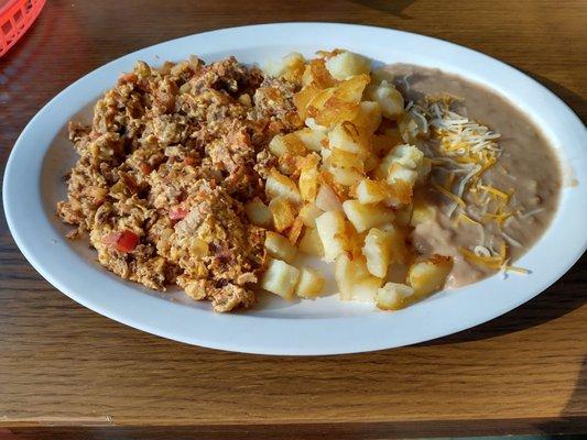 One of the Mexican breakfast options: beef with egg, home fries, and beans. Scrumptious! :)