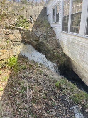 Babbling brook next to the building