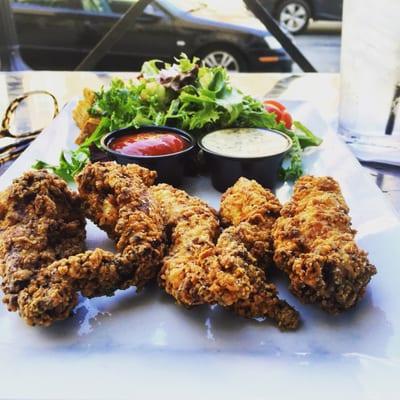 Chicken tenders with a side salad.