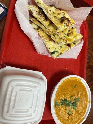 Garlic Naan, Chicken Tikka Masala, buttered/herb rice -- I love dipping the naan in the masala gravy. Wonderful flavors and a ton of food!