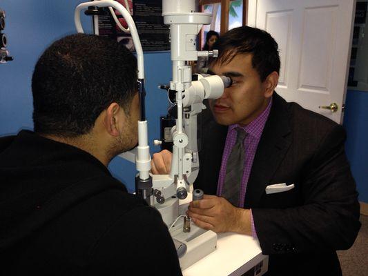 Katy office: Dr. Duong checking the anterior segment of the Eye.