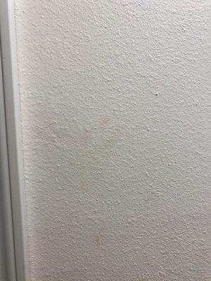 Blood stains on wall