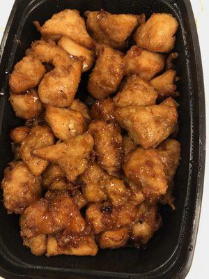 This is supposed to be "Mongolian chicken".  Just over fried chicken nuggets and no veggies. Seasoned only with oil and soy sauce.