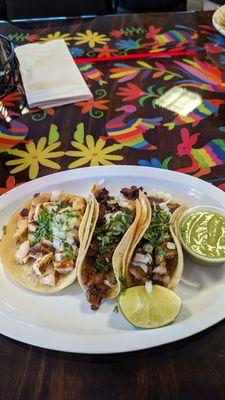 Street tacos in chicken, carnitas, and el pastor.