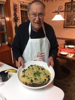 My 95 year old dad showing off our spaghetti bianca puttanesca with your olives!