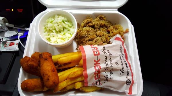 BBQ Plate with pulled pork, fries, slaw, and hush puppies.