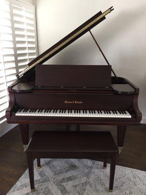 Gorgeous. Completely redone.  Prior piano was worn with age and a bit dirty.  Paul brought this family treasure back to life.