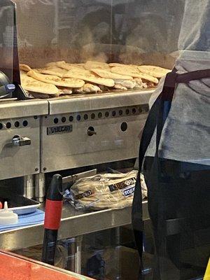 Pita heated over chicken