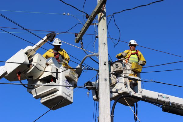 Lineworkers making repairs following damage caused by the Cape Cod tornadoes