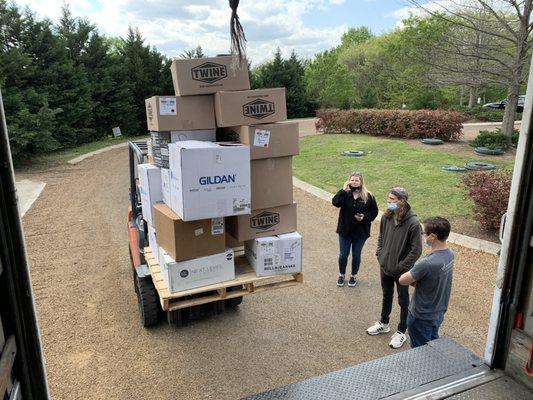 Our driver had to palletize this pathetic pile of used boxes shipped from Twine to Arrington.