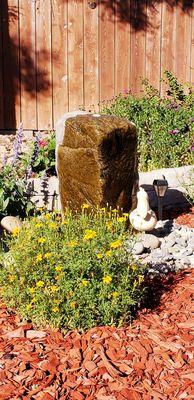 Relaxing sounds in my backyard.   Perfect for a bird bath too!