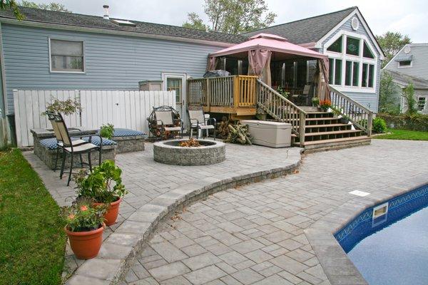 Raised paver patio with firepit