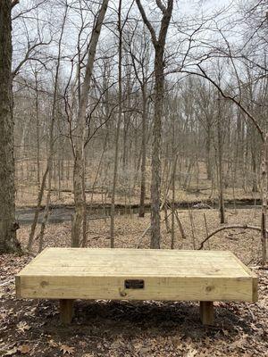 Bench along the trail overlooking the creek.