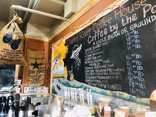 View from the right of the ordering counter, looking behind the counter from the coffee condiment area.