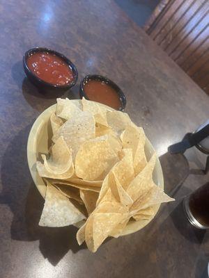 Complimentary chips (which were crisp and tasty) with mild sauce and apricot sauce.