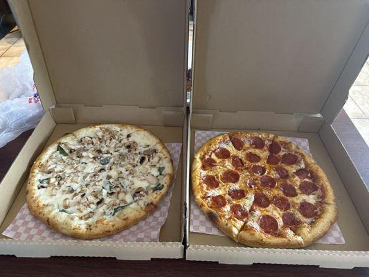 Alfredo pizza and pepperoni pizza