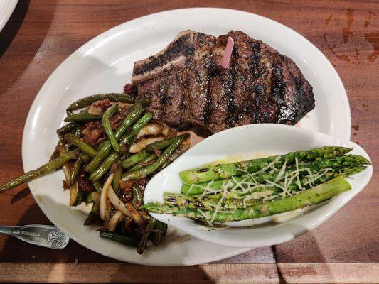 Outlaw ribeye with green beans and grilled asparagus