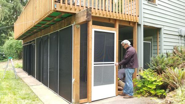 Under deck enclosure with Riviera screen doors.