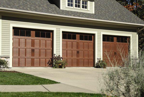 Carriage House Steel Collection model 307 with Red Oak Stain finish and 6-Lite Square Glass