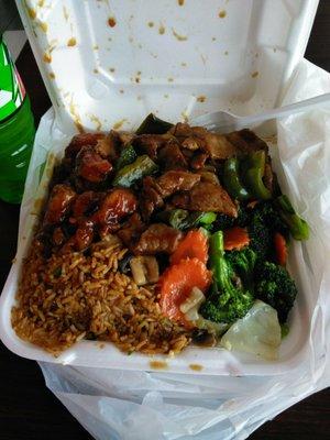 Shrimp fried rice, sesame chicken, veggies, and pepper steak.