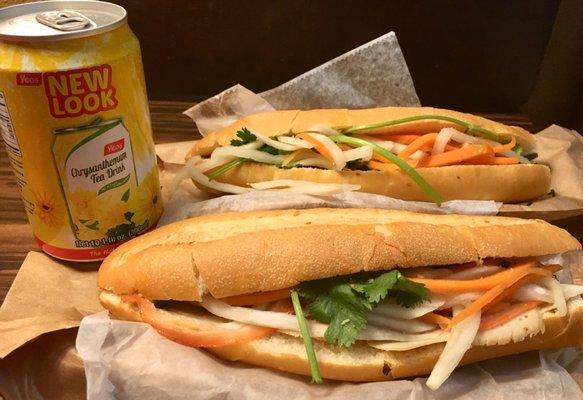 Cold cut and spicy beef sandwich with can of chrysanthemum tea drink just under $10