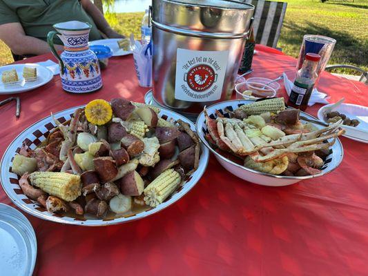 Seafood Boils with shrimp, crab legs, potatoes, corn, onions and sausage