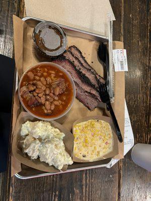 Brisket, potato salad, creamed corn and brisket baked beans..