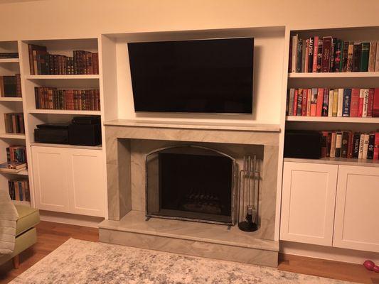 Fireplace and built in bookshelves