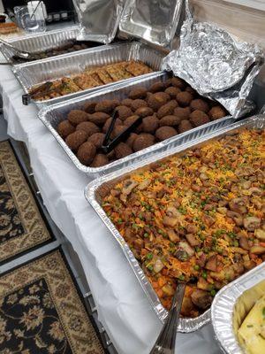 Rice with vegetables and Falafel.