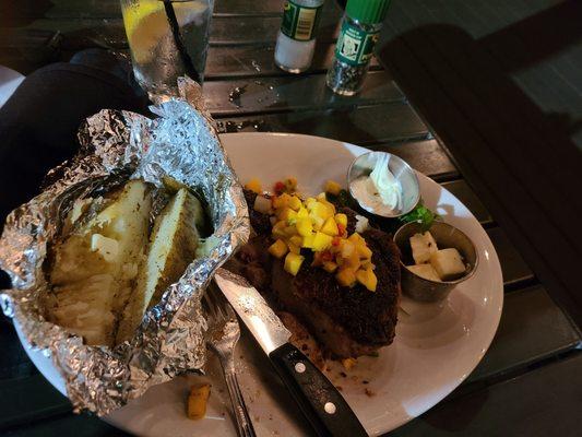 Pork chop with baked potato