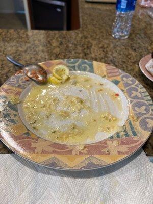 An empty plate of chicken francese