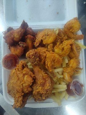 Ultimate plate, 2 PC legs n thighs, 8 shrimps, 8 Wings, and basket load of fries