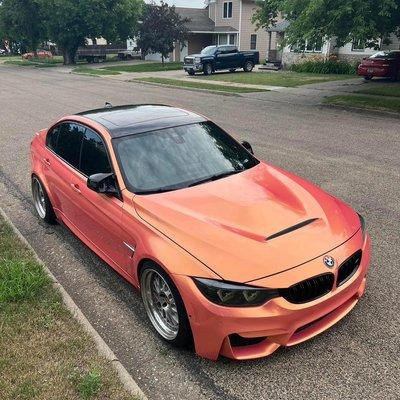 2017 BMW M3  vinyl wrapped in Teckwrap metallic, coral peach with a 1 year ceramic coat .