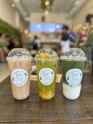 Roasted Oolong Milk Cha (left), mango kiwi cha, and matcha latte (right)