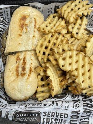 Philly Cheesesteak & waffle fries