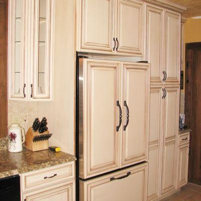 Blend in your appliances with custom cabinets and new hardware