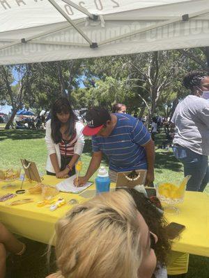 Community members signing up for events