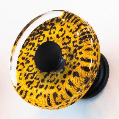 Want to go a little wild with your cabinet hardware? Check out this cheetah, round knob from Atlas. The knob is glass.