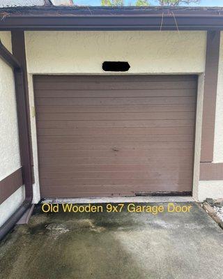 Old garage door ready to get replaced