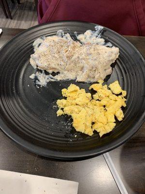 Half order sausage gravy, eggs scrambled w/American cheese.