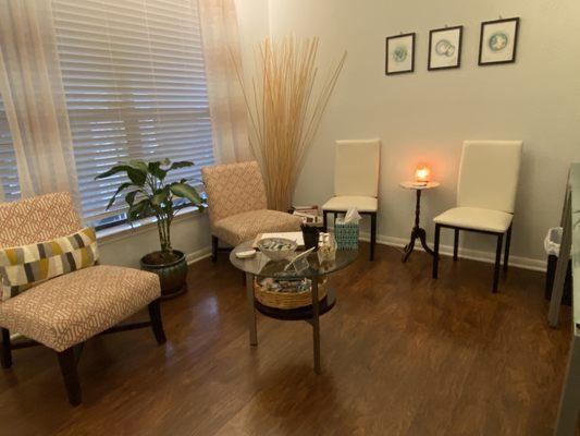 Relax and unwind before and after your treatment in our seating area.