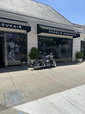 Men's clothing store and a very cool motorcycle in front of