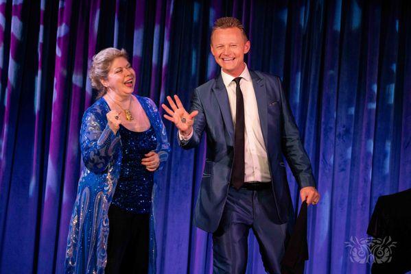 Joel Ward performing his show with a volunteer onstage at The Magic Castle in Hollywood.