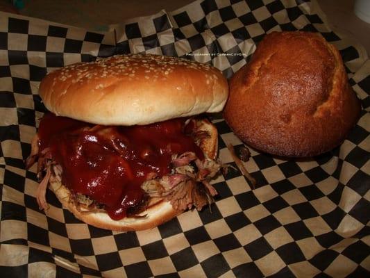 Pulled pork sandwich with cornbread.